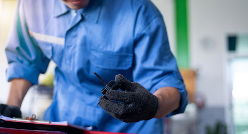 MINI Mechanic Checking Fluid Level